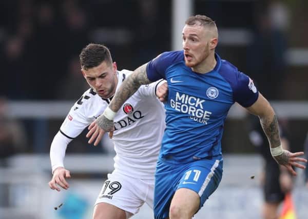 Marcus Maddison is pushing for a start for Posh at Gillingham.