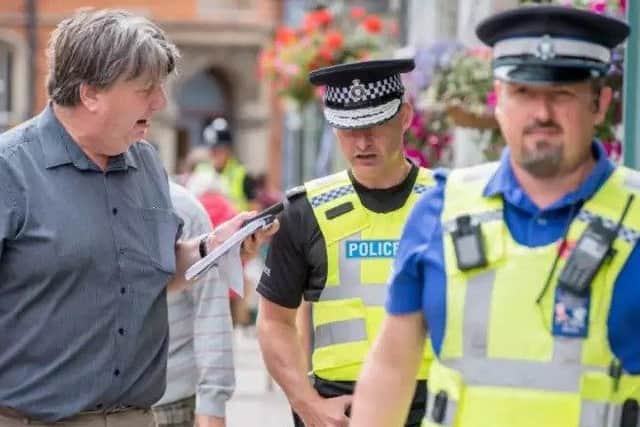 Chief Constable Bill Skelly (centre) has warned of 'stark choices' ahead.