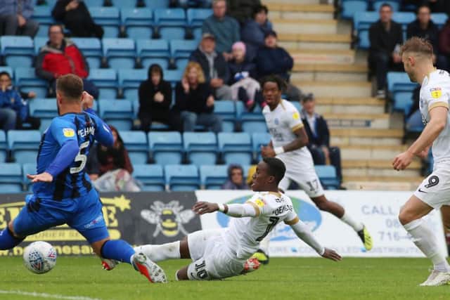 Siriki Dembele scores the second Posh goal at Gillingham. Photo: Joe Dent/theposh.com.