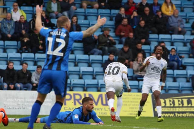 Siriki Dembele is off and running after scoring for at Gillingham. Photo: Joe Dent/theposh.com.