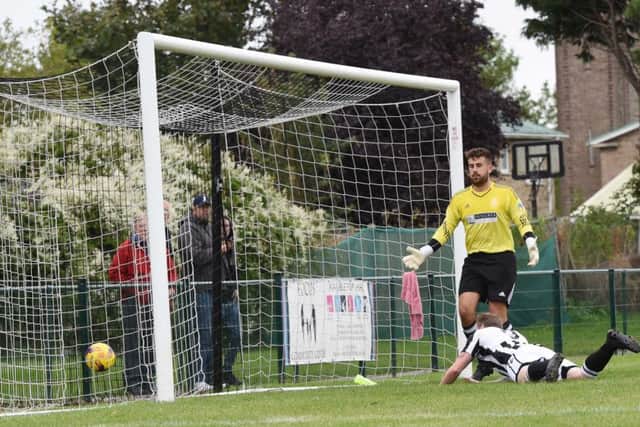 Corey Kingston of Peterborough Northern Star scores the winning goal against Oadby. Photo: Chantelle McDonald. @cmcdphotos.