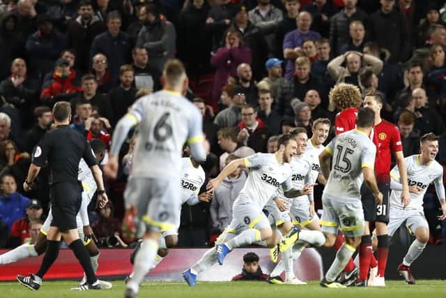Jack Marriott (centre) celebrates his first Derby County goal at Old Trafford.
