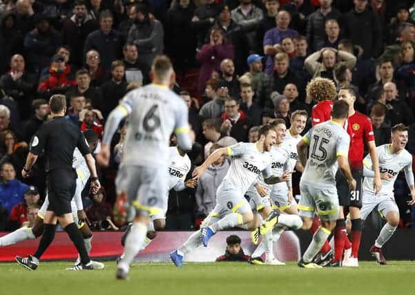 Jack Marriott (centre) celebrates his first Derby County goal at Old Trafford.