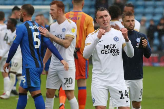Callum Cooke celebrates the Posh win at Gillingham. Photo: Joe Dent/theposh.com.