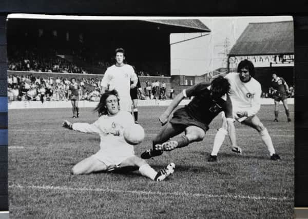 John Cozens (right) in action for Posh.