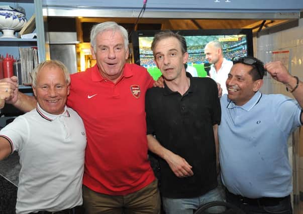 Pep Fasulo, pictured right, at The Pizza House during the World Cup in 2014.