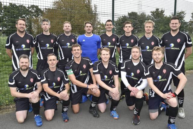 The Bourne Deeping team that drew 4-4 with Spalding in the East Premier B Division, back row, left to right, Simon Shorter, Phil Arnold, James Sharpe, Shane Carlton, Andy Williams, Oli Varton, Ali Stitton, Stuart Biggs. (front) Andrew Kind,  Andrew Fletcher, Ben Slack, Tom Everton, Rob Dalton and Chris Clarkson.