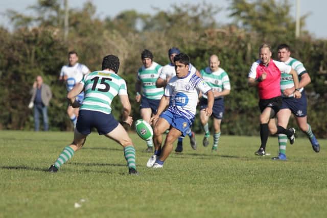 Franco Perticaro kicks ahead for the Lions. Picture: Mick Sutterby
