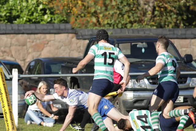 Rory White scores a try for the Lions at South Leicester. Picture: Mick Sutterby