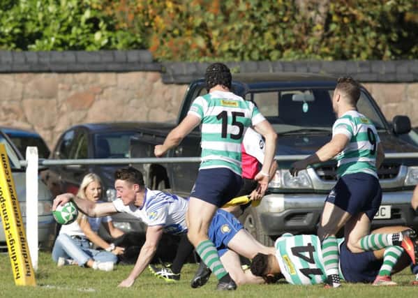 Rory White scores a try for the Lions at South Leicester. Picture: Mick Sutterby