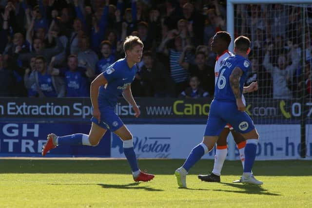 Mark O'Hara is off to celebrate after scoring a great goal for Posh. Photo: Joe Dent/theposh.com.