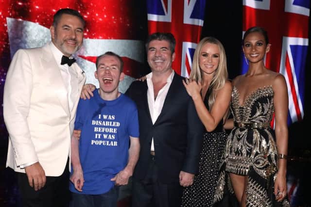 Lost Voice Guy celebrates winning Britain's Got Talent.