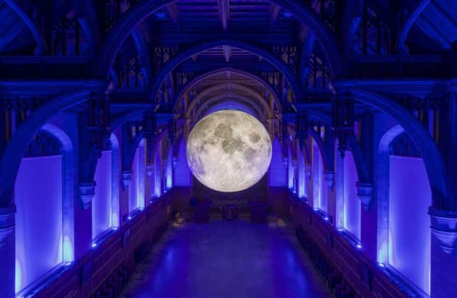 Luke JerramÃ¢Â¬"s Museum of the Moon at the University of Bristol, Bristol, UK
A large balloon covered in images of the surface of the moon from NASA has been installed in the Great Hall of the Wills Memorial Building at the University of Bristol by local artist Luke Jerram. The installation is called the Museum of the Moon and is to mark the investiture of the new Chancellor, Sir Paul Nurse.
23rd March 2017.
Carolyn Eaton/Alamy News Live