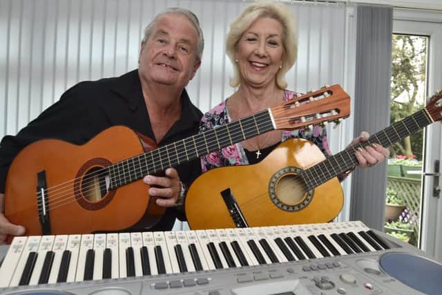 John and Rosie Sandall with musical instruments for sale at their next Chernobyl event EMN-180110-223904009