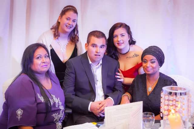 Spencer with his carers