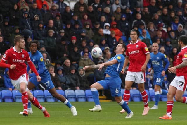 Jamie Walker of Peterborough United in action against Barnsley. Photo: Joe Dent/theposh.com