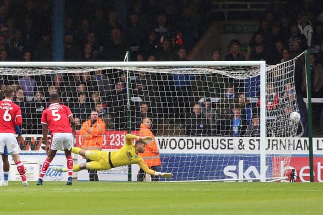 Aaron Chapman of Peterborough United dives in vain as Brad Potts of Barnsley (not in picture) fires in his sides second goal of the game. Photo: Joe Dent/theposh.com