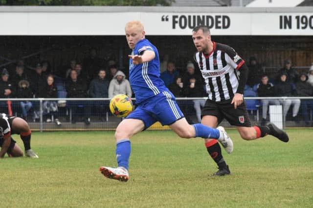 Lewis Hilliard of Peterborough Sports tries to mount an attack against Chorley. Photo: James Richardson.