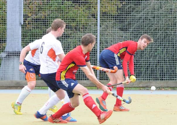Adam Wilson (far, red) scored twice for City of Peterborough at OId Loughtonians.