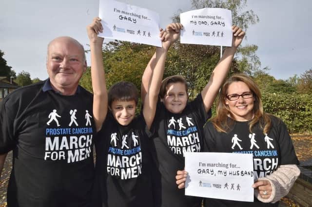 March for Men charity walk at Ferry Meadows.
Gary Bingham with Jordon Foster and William and Sarah Bingham. EMN-180810-122933009