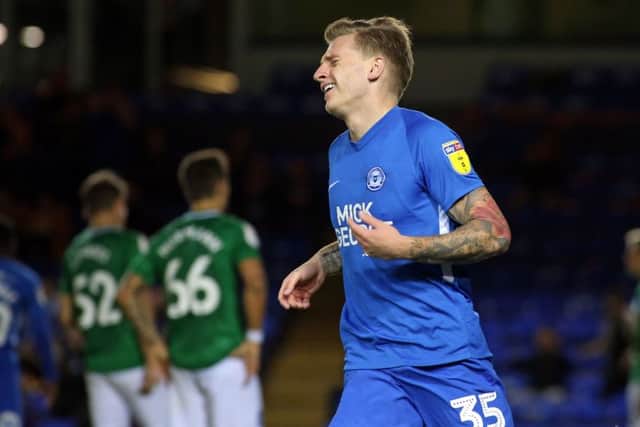 Jason Cummings celebrates his goal for Posh against Brighton. Photo: Joe Dent/theposh.com.