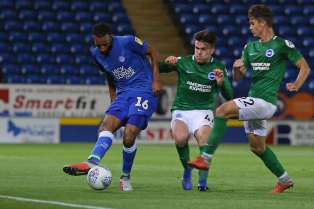 Posh centre-back Rhys Bennett in action against Brighton. Photo: Joe Dent/theposh.com.