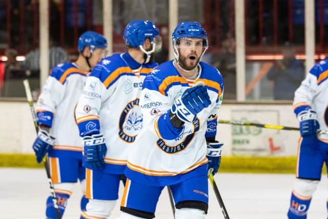 Tom Norton celebrates scoring the equaliser