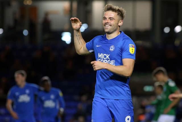 Posh striker Matt Godden is happy to return to Scunthorpe.