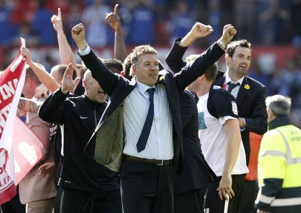 Posh boss Darren Ferguson celebrates promotion after the League One play-off final at Old Trafford in 2011.