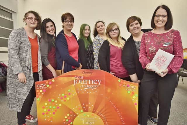 Marie Bailey, Donna Parnell, Luisa Bailey, Becca Wells, Vanessa Rosales, Mary Flaherty, Rosie Hutchcraft and Fletton Centre Slimming World organiser Helen Johns -  some of the club members who have lost 1,000 pounds in weight. EMN-180926-125547009