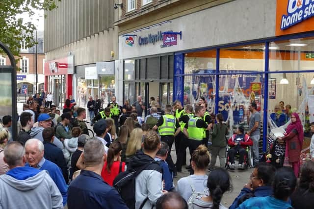 Armed police outside B&M. Photo: Terry Harris