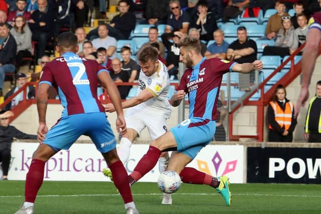 Posh striker Matt Godden scores his second goal at Scunthorpe. Photo: Joe Dent/theposh.com.