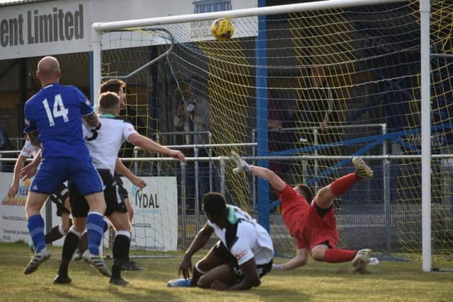 Action from Peterborough Sports (blue) 2, Cambridge City 4. Photo: James Richardson.