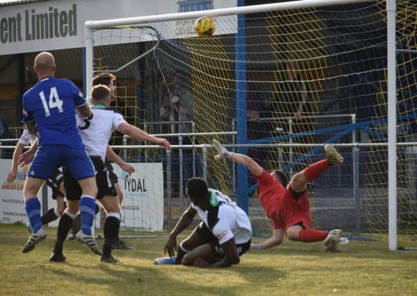 Action from Peterborough Sports (blue) 2, Cambridge City 4. Photo: James Richardson.