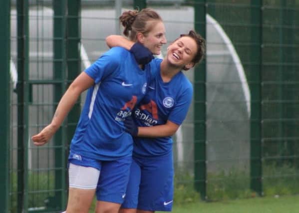Stacey McConville and Donna McGuigan celebrate a Posh goal. Picture: Gary Reed