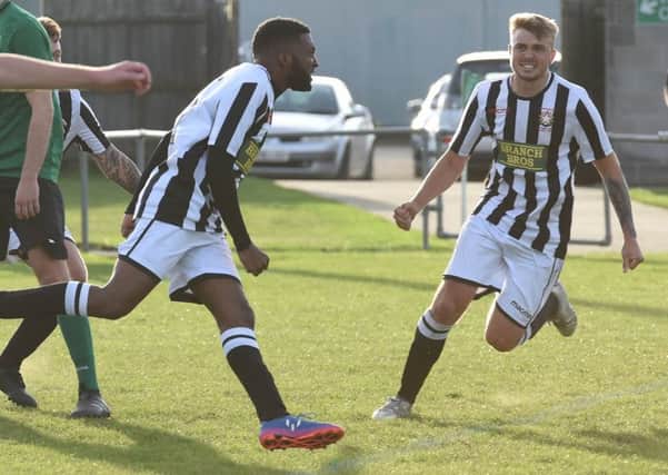 Jermaine Wilson (left) celebrates his goal for Peterborough Northern Star at Sleaford in Saturday's FA Vase draw. Photo: Chantelle McDonald. @cmcdphotos.