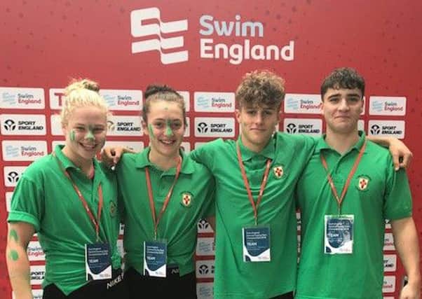 Deepings swimmers Holly Leggott, Bethany Eagle-Brown, Louis Metselaar and Tom Neal in the green of Lincolnshire at the National County Team Championships