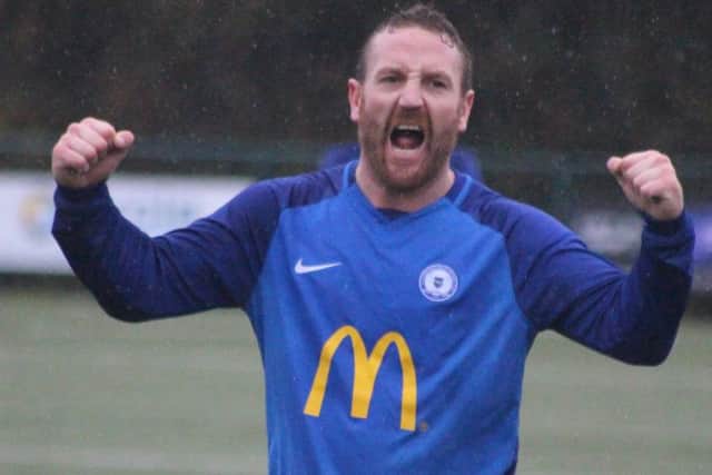 David Adams celebrates after the game.