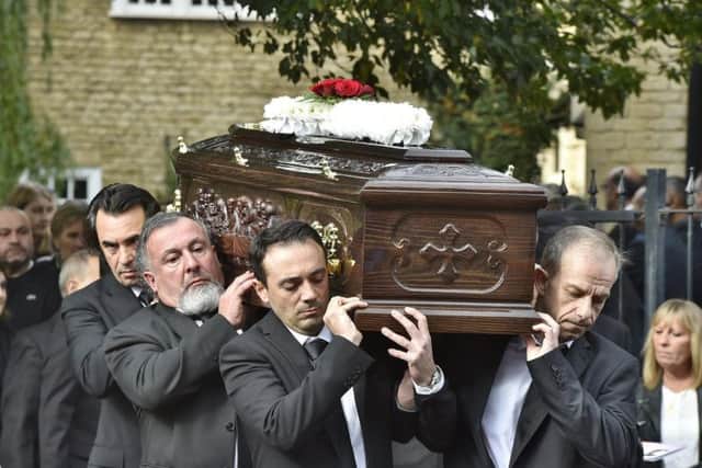 Pep's coffin being carried into the church
