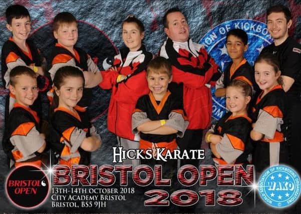 The Hicks Karate School squad at the Bristol Open. From the left are, back, Aaron Leonard, Warren Bothamley, Atlanta Hickman, Sensei Andrew Hicks, Shiv Panchal, Aaron Dickerson, front, Oliver Profitt, Sophie Doyle, Joshua Leonard, Sophie Hicks and  Lucy Hicks. Picture: IMFAMOUS PHOTOGRAPHY