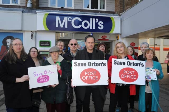 Members of the Green Party with Coun.  Julie Howell outside McColl's store at Ortongate shopping centre protesting about possible post office closure. EMN-180326-134244009