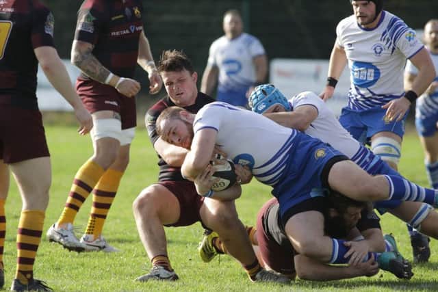 Josh Waller drives forward for the Lions. Picture: Mick Sutterby