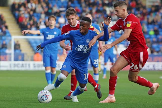 Siriki Dembele of Peterborough United takes on Dan Barlaser of Accrington Stanley - Mandatory by-line: Joe Dent/JMP - 20/10/2018 - FOOTBALL - ABAX Stadium - Peterborough, England - Peterborough United v Accrington Stanley - Sky Bet League One