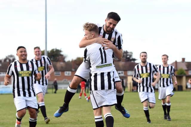 Lukas Gereltauskas (11) of Peterborough Northern Star celebrates scoring against Harborough Town with team-mates. Picture: Chantelle McDonald
