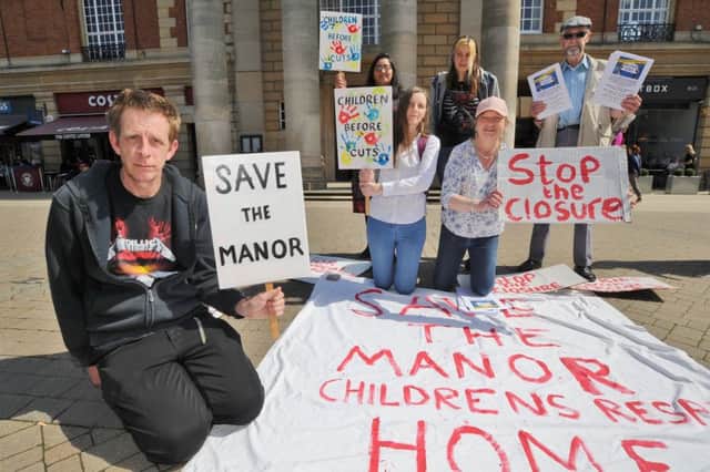 Save the Manor protest in Bridge Street. (front left)  Neil Webber. (back right) John Webber EMN-180418-153304009