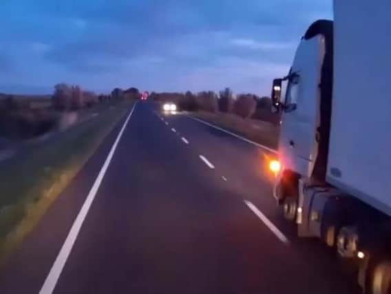 The heart-stopping dashcam footage showing the overtaking lorry on the A16