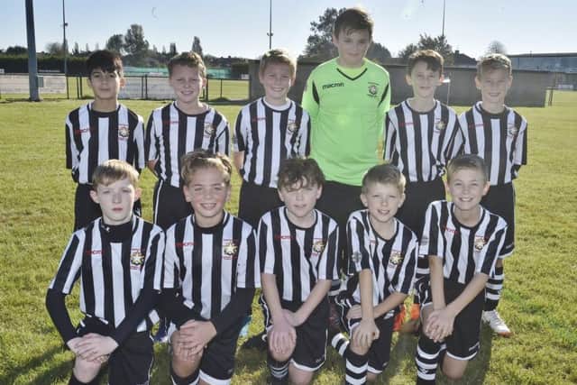 Pictured are Peterboroiugh Northern Star Red Under 12s before their 2-1 defeat by Stanground Sports Under 12s. They are from the left, back,  Suhib Ali, Lewis Smith, Benjamin Roddy, Samuel Buckland, Tyler Sansom, Freddie Muir, front, Louis Taylor, Ashton Stevens, Liam Burrows, Maximus Malyon and Jude Harrop.