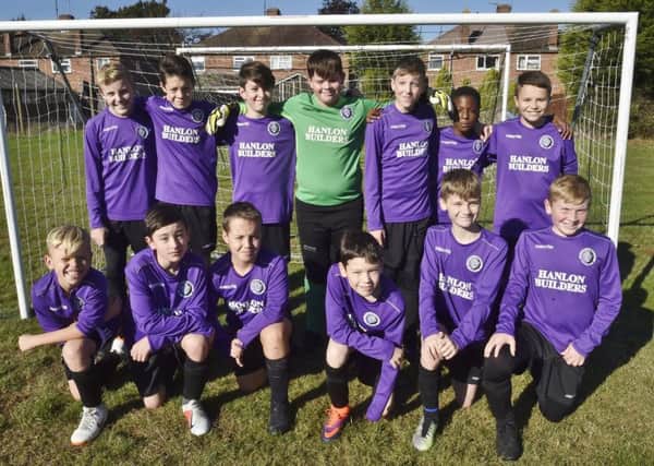 Stanground Sports Under 12s are pictured before their 2-1 win against Peterborough Northern Star Red. They are from the left, back, Ryan Wilson, Lewis Mansell, Seb Ponte, Lewis Veni, Kallum Read, Michael Mhlanga, Robbie Hanlon , front,  Callum Parker, Charlie Harcus, Luke Sharpe, Jacob Bereznyckyj, Charlie Statham and Rory Wilson.
