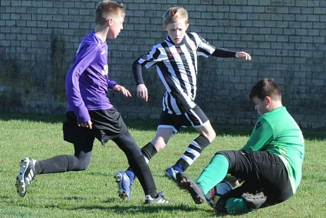 Action from Northern Star U12s Red v Stanground Sports.