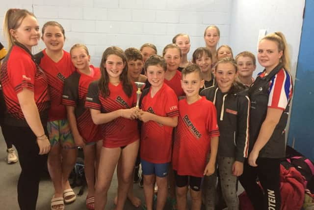 The Deepings Swimming Club team with their third-place trophy in the Junior Fenland League B Final